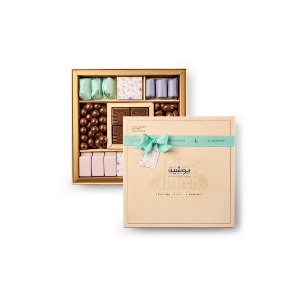 Elegant Hardboard box filled with premium wrapped chocolates and dragee